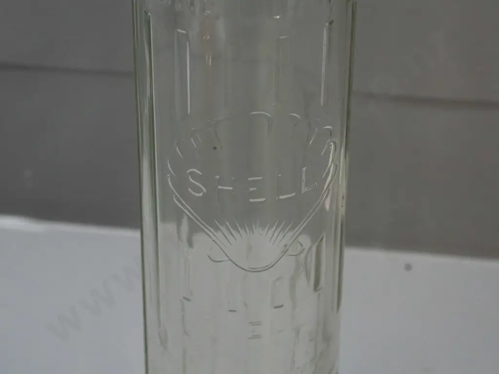 clear glass Shell New Zealand quart oil bottle H-365 Image 1++