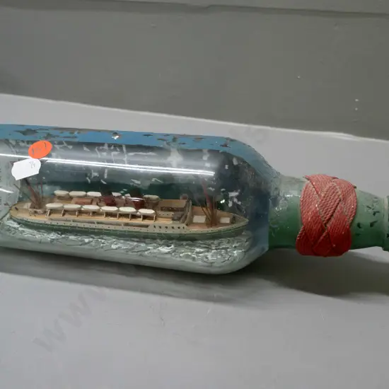 vintage ship in bottle - ship model marked Rangatira - some paint loss to outside L-270