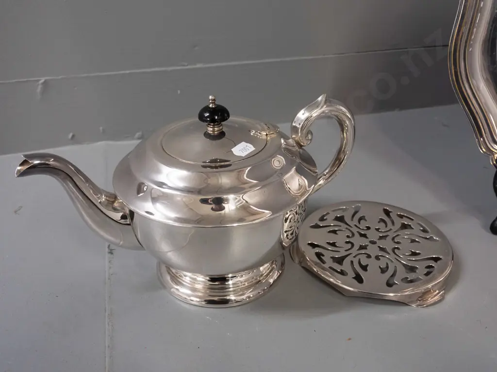 silver plated table ware - teapot on stand, cream & sugar and pyrex dish in plated holder, all with black bakelite or Image 1++