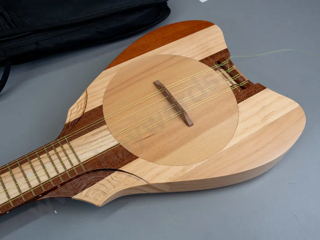 Cagou Tahitian style 8-string ukulele - mixed timbers with carved detail, 22 fret, made by Andre Laufatte in New Image 1++