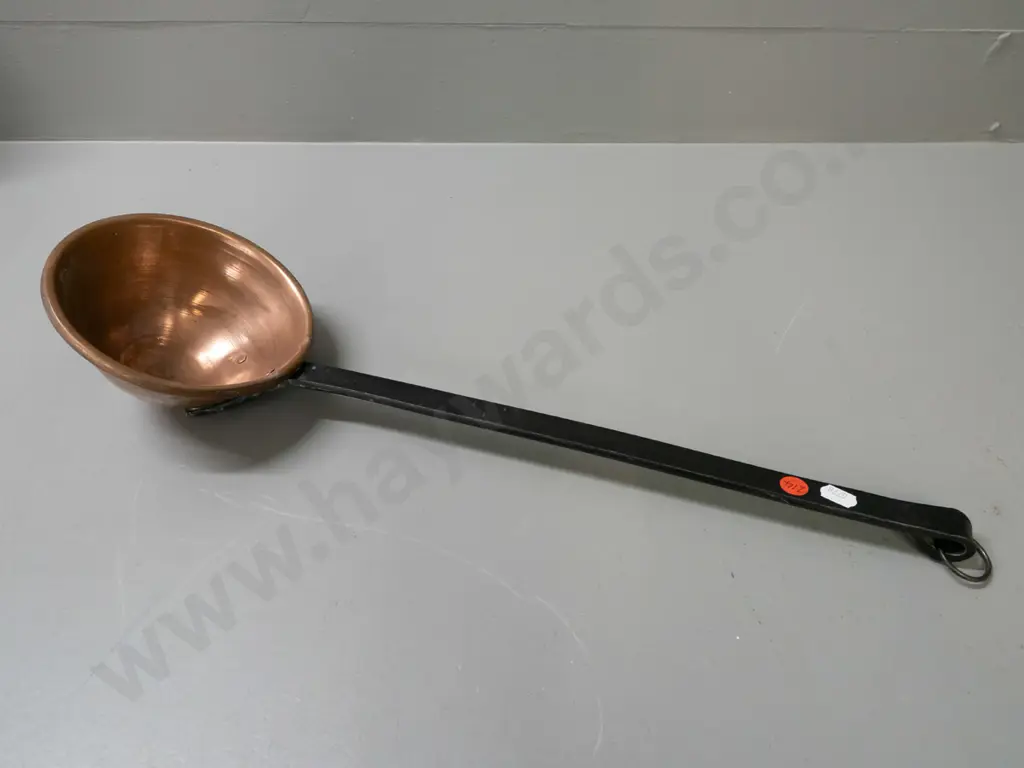 large ladle with copper bowl and wrought iron handle with hanging ring L-500 D-145 across bowl Image 1++