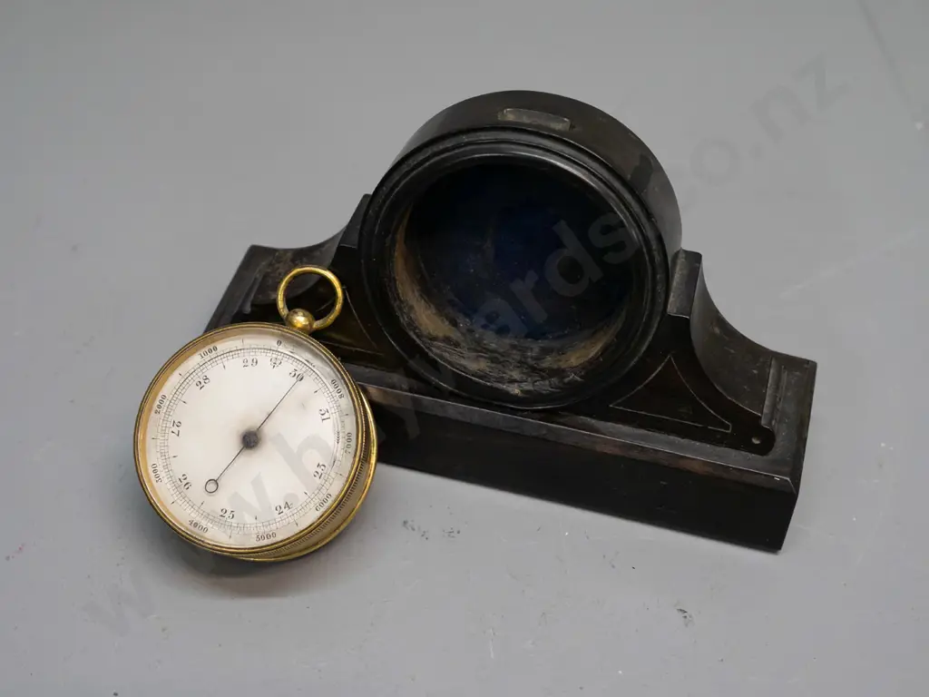 vintage pocket barometer in an ebony or lignum vitae watch holder - some discolouration to barometer face, screw holes Image 1++
