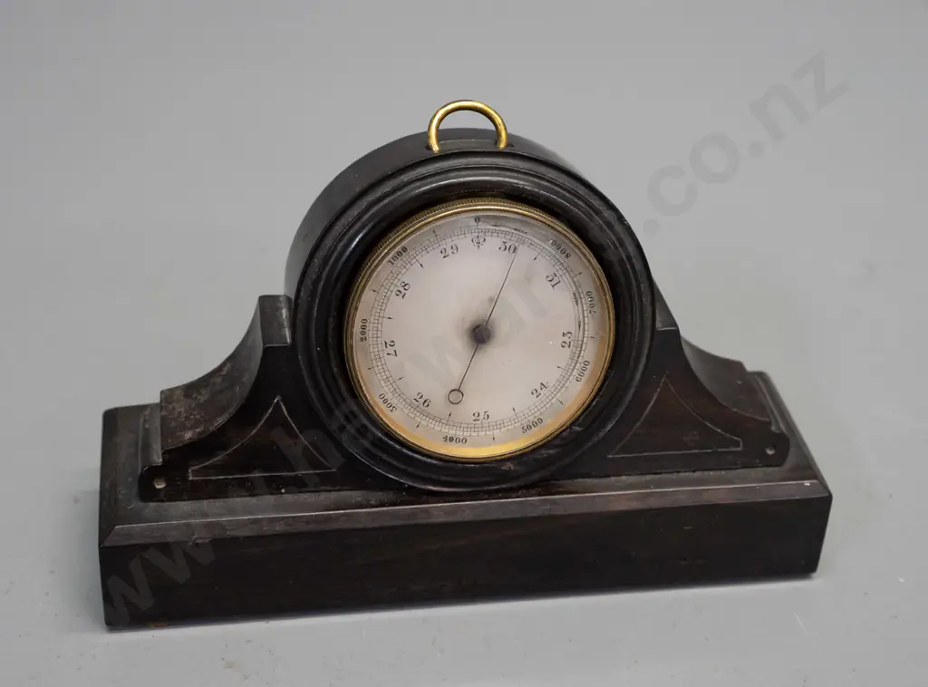vintage pocket barometer in an ebony or lignum vitae watch holder - some discolouration to barometer face, screw holes Image 1++