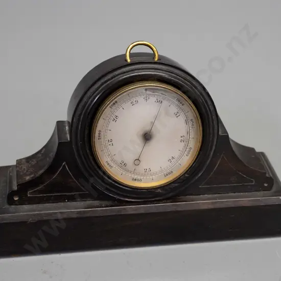 vintage pocket barometer in an ebony or lignum vitae watch holder - some discolouration to barometer face, screw holes
