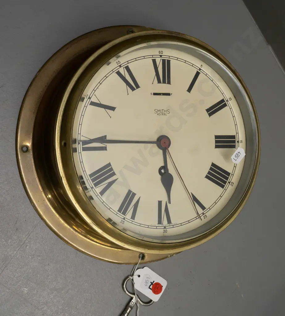 Smiths Astral brass-cased ship's clock with key, bevelled edge glass - some discolouration to brass D-260 Image 1++