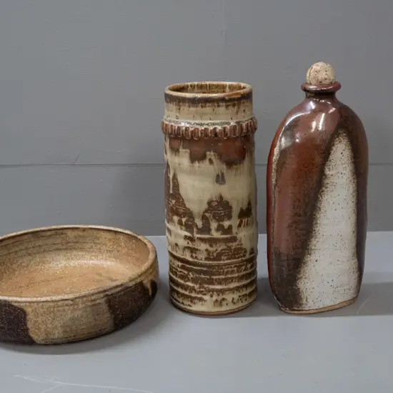 3 New Zealand studio pottery items - ribbed vase( marked GB?) flask with cork stopper a bowl with Alexandra Goldfield