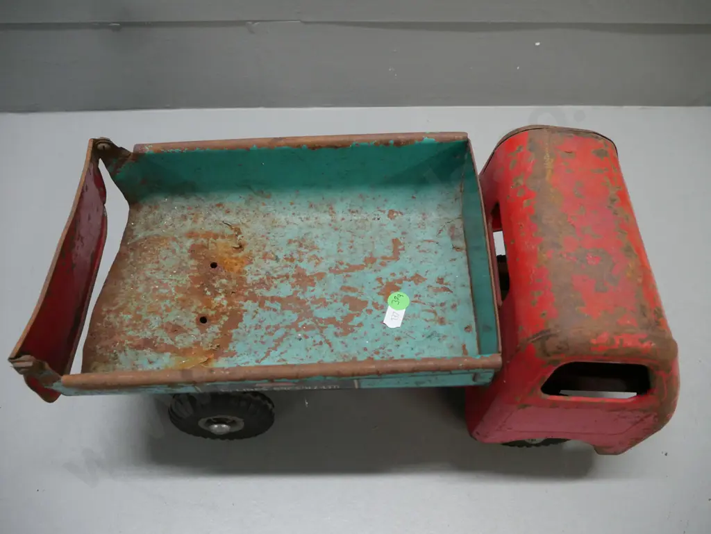 Tri-Ang Dump Truck H-190 L-380 [rolls OK; damage to back; corrosion, abrasions & pitting; significant rust] Image 1++