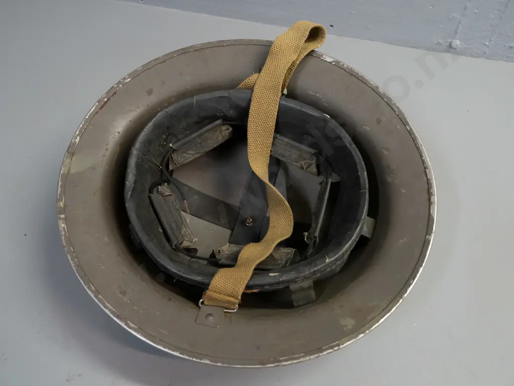 WWII-era British army helmet with suspension liner, webbing strap, missing top dome - overall age wear Image 1++