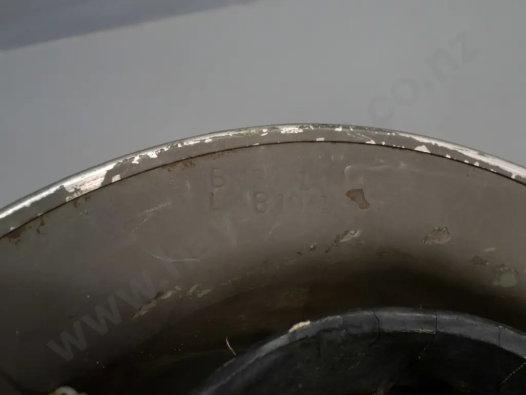 WWII-era British army helmet with suspension liner, webbing strap, missing top dome - overall age wear Image 1++