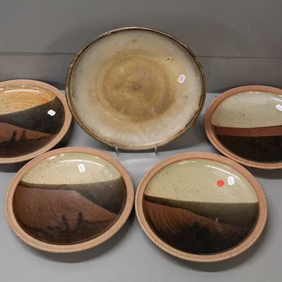 5 New Zealand studio pottery plates - 4 are unmarked Tenmoku glaze, one with unknown (LC?) maker's mark D-250