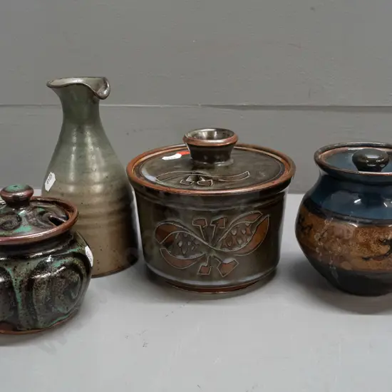 4 pieces of New Zealand studio pottery - 3 lidded containers, one with spoon cutout, and an oil bottle H-170,