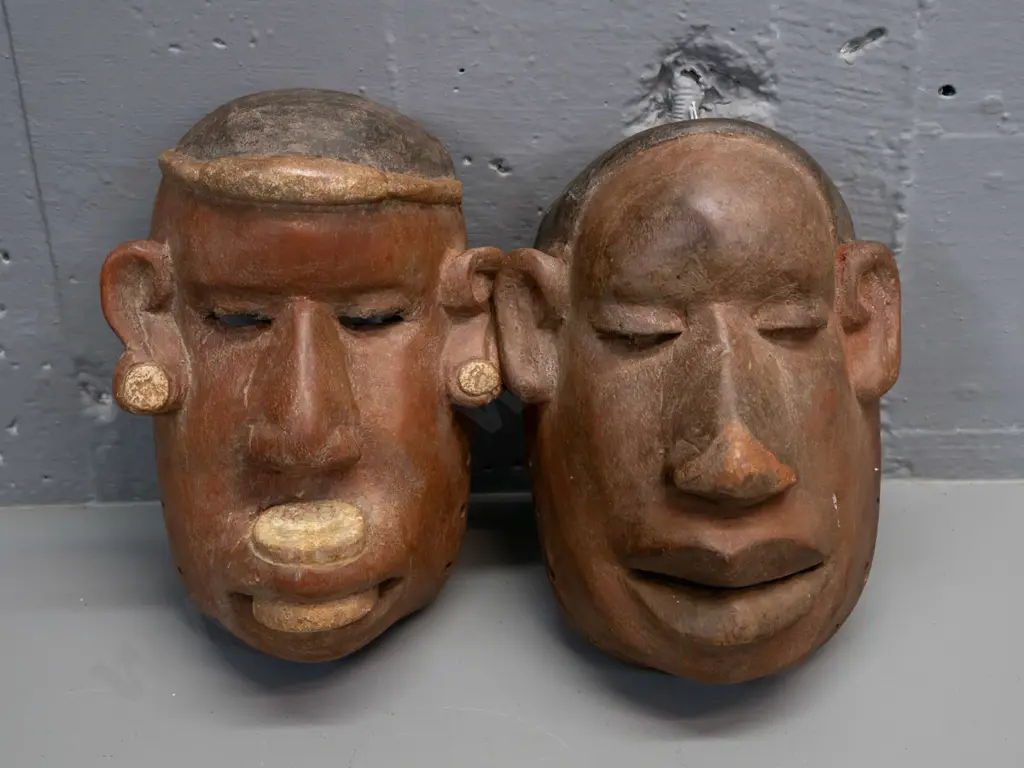 2 carved wood Makonde masks from Tanzania - one has chip to bottom H-220 W-150 Image 1++