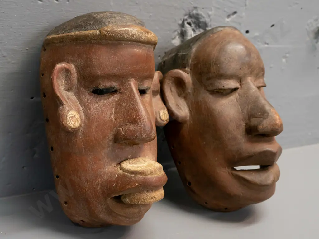 2 carved wood Makonde masks from Tanzania - one has chip to bottom H-220 W-150 Image 1++