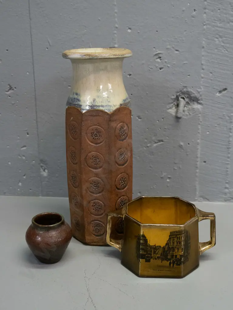 tall studio pottery vase with impressed decoration, small squat pottery vase and an Excella English Dunedin Image 1++