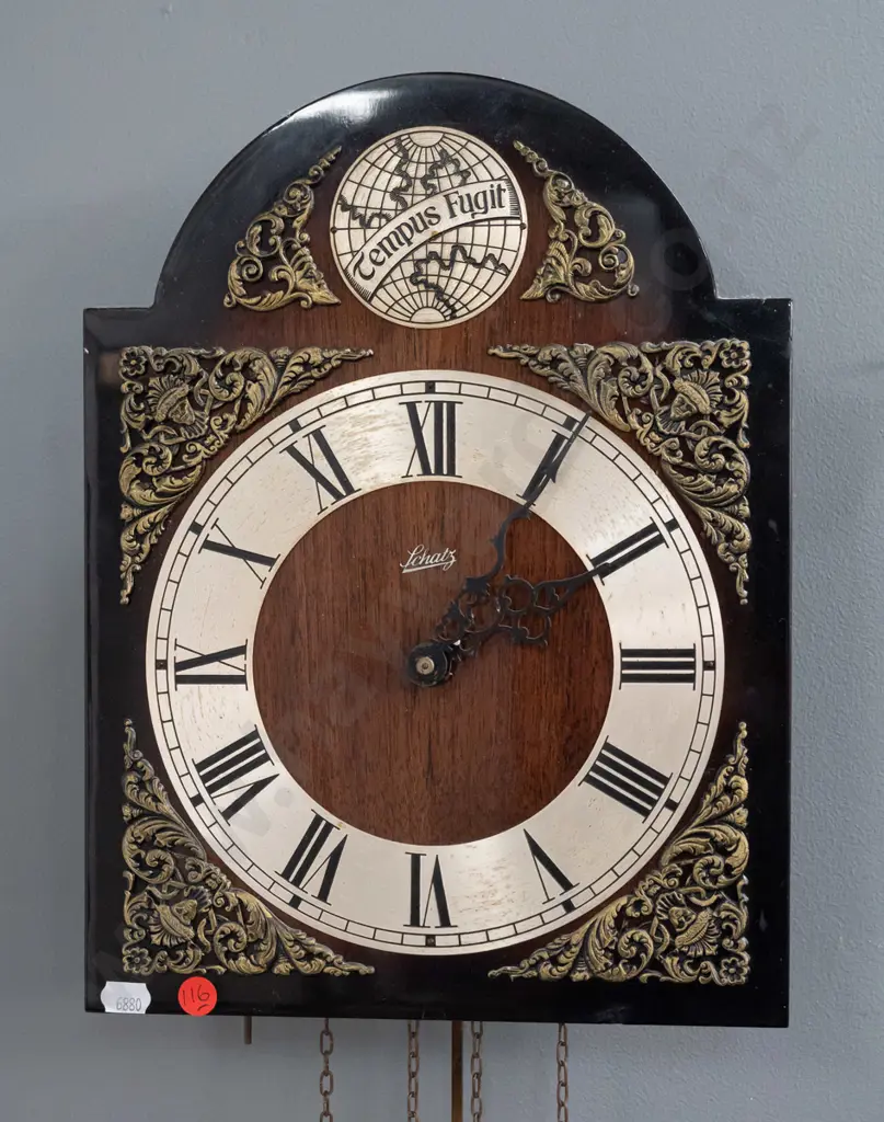 retro Schatz German arch-top wall clock with applied cast decoration, Tempus Fugit logo, brass weights and pendulum. Image 1++