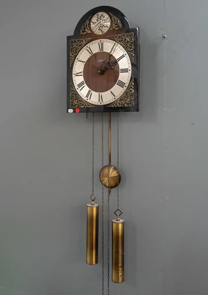 retro Schatz German arch-top wall clock with applied cast decoration, Tempus Fugit logo, brass weights and pendulum. Image 1++