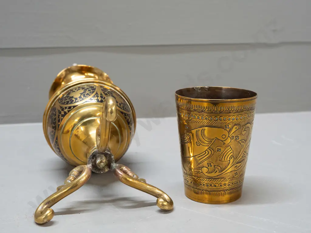2 brass items - vase on 3 scrolling legs with black enamel work and a tumbler with incised bird motifs - vase has had Image 1++