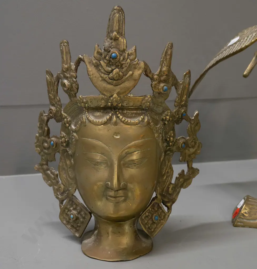 2 cast brass pieces - crane and a Thai-style head, missing a few blue stone or glass inserts, both approx. H-240 Image 1++