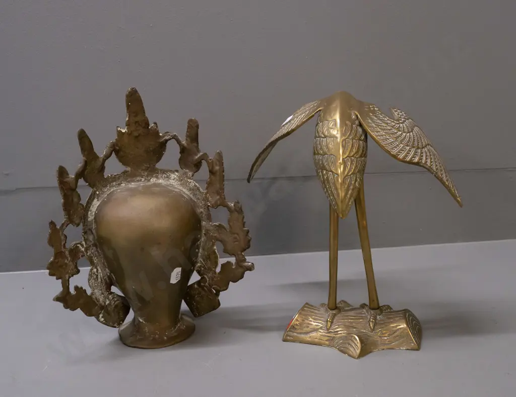 2 cast brass pieces - crane and a Thai-style head, missing a few blue stone or glass inserts, both approx. H-240 Image 1++