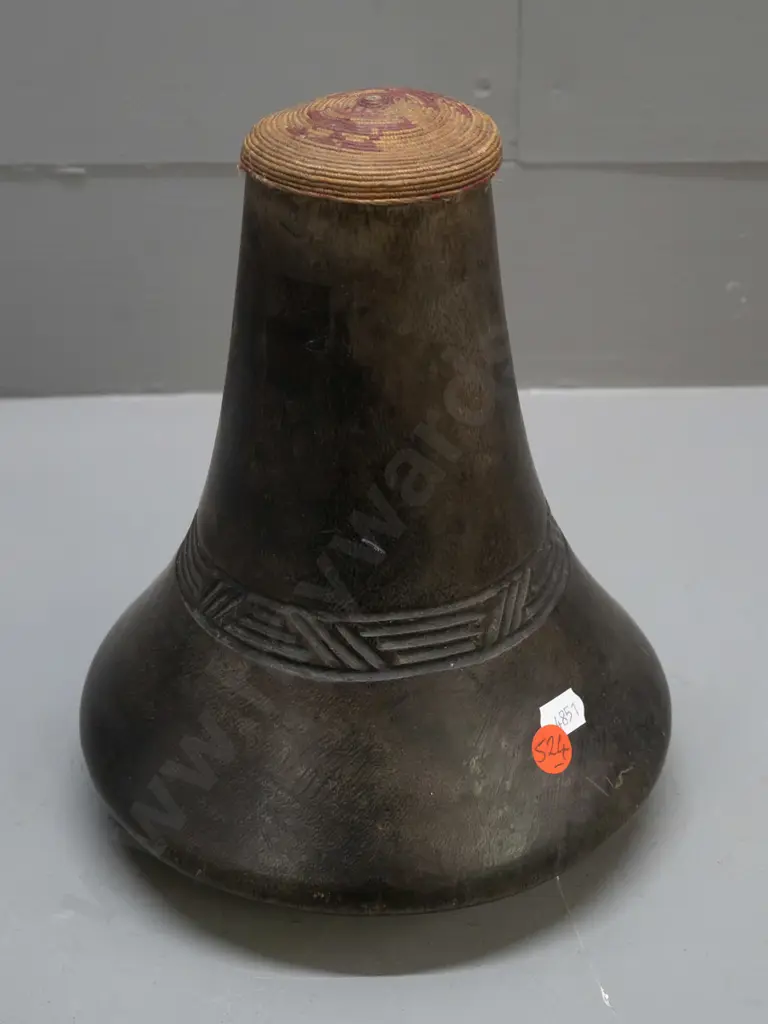 carved wood milk container with woven cap, Ekyanzi tribe, Uganda. H-230 D-180. Image 1++