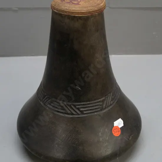 carved wood milk container with woven cap, Ekyanzi tribe, Uganda. H-230 D-180.