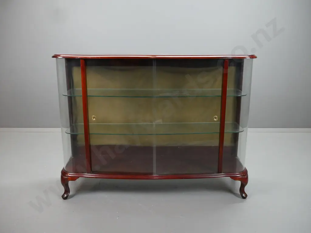 mid-century mahogany cab-leg display cabinet with bowed glass ends, 2 glass sliding doors and 2 fixed glass shelves, Image 1++
