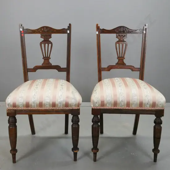 pair of Edwardian walnut and beech side chairs with carved back splats, turned front legs, some scratches / chips