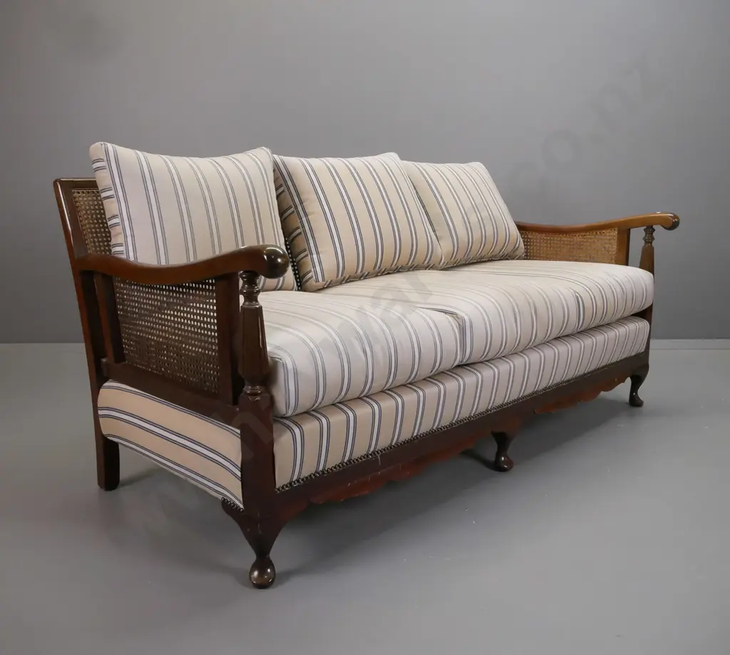 mid-century mahogany cab-leg bergere cane settee with shaped crest to back, fluted arm supports, striped fabric squabs - Image 1++
