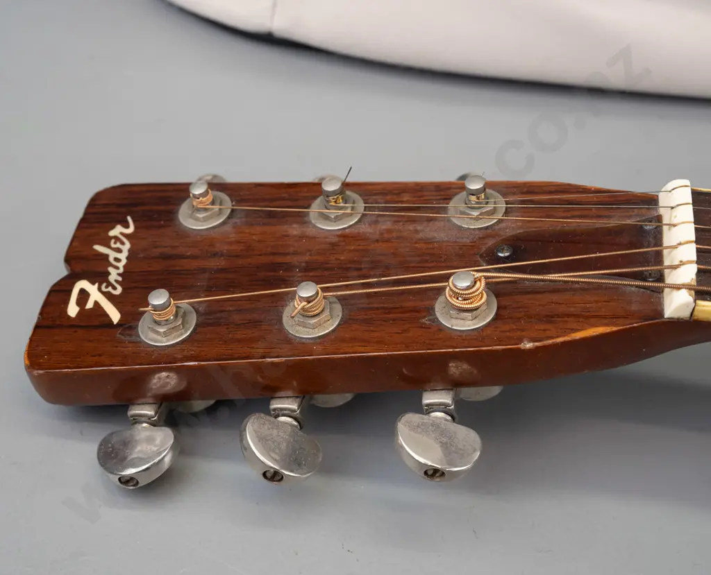 Fender F-65 dreadnought acoustic guitar, circa 1970s, with Dixon padded gig bag and some spare strings. Has some dents Image 1++