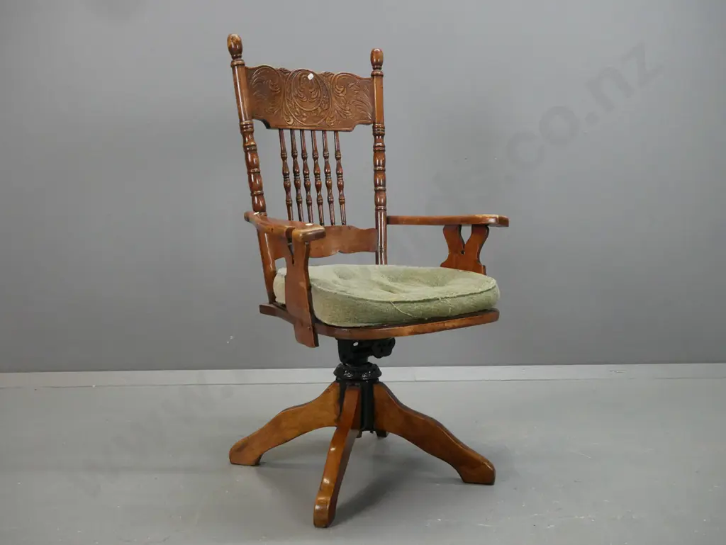 Edwardian beech desk chair with press-carved and turned spindle back, tilting & rotating base, pierced ply seat marked Image 1++