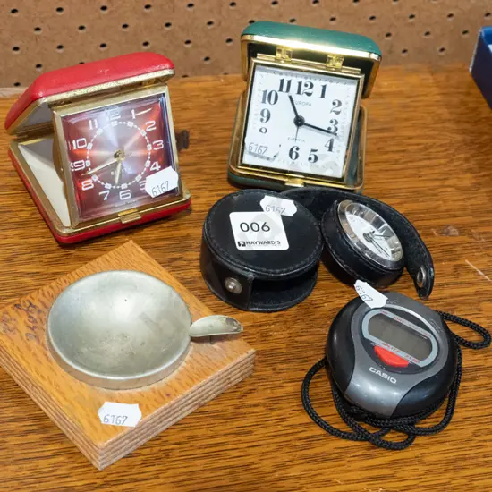 travel alarm clocks, stop-watch and ashtray