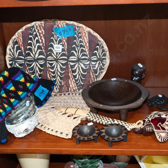 souvenir Fiji ware, paua shells, and a hat