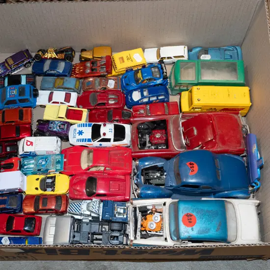 box of toy vehicles