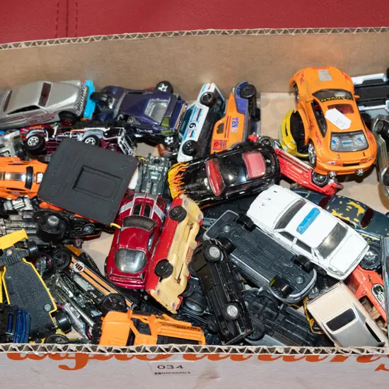 box of toy vehicles