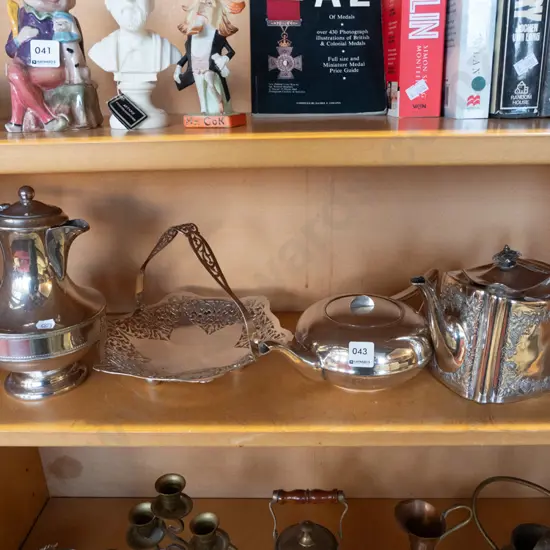 shelf of plated ware - teapots, coffee pot, basket tray