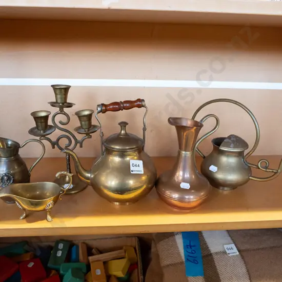 shelf of copper and brass ware - jugs, teapot, candelabra H-210