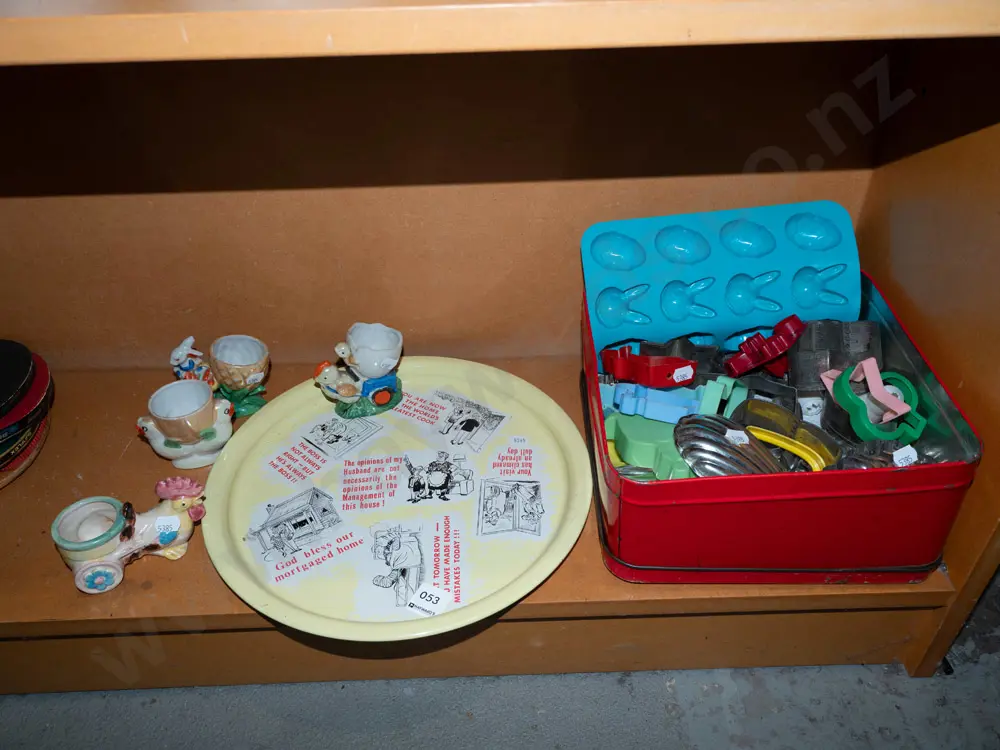 metal tray, novelty eggcups, cake tin with cookie cutters and moulds Image 1++