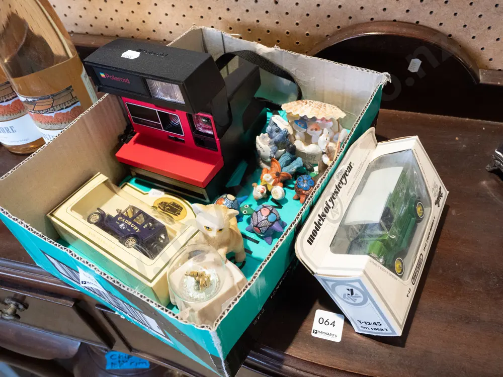 box; Models of Yesteryear and Cadbury die-cast vehicles, Polaroid camera, various toys etc Image 1++
