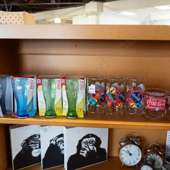 assorted coca cola promotional glasses