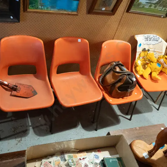 4x orange plastic stackable chairs - need a clean
