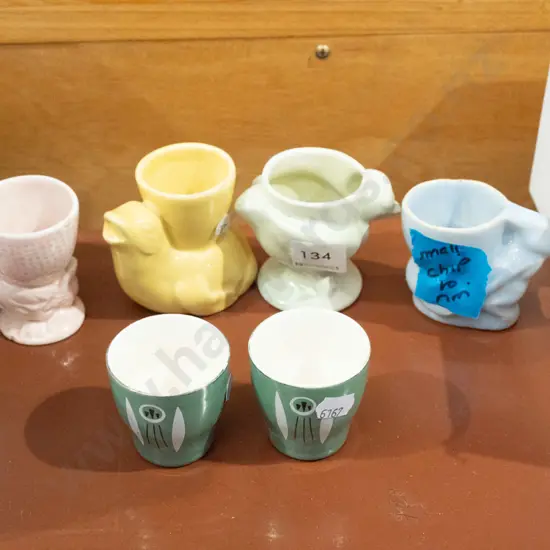 6x egg cups - some have small chips/cracks