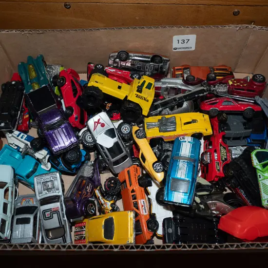 box of toy vehicles