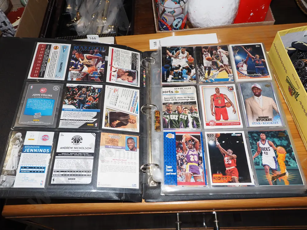 binder of basketball collector cards Image 1++