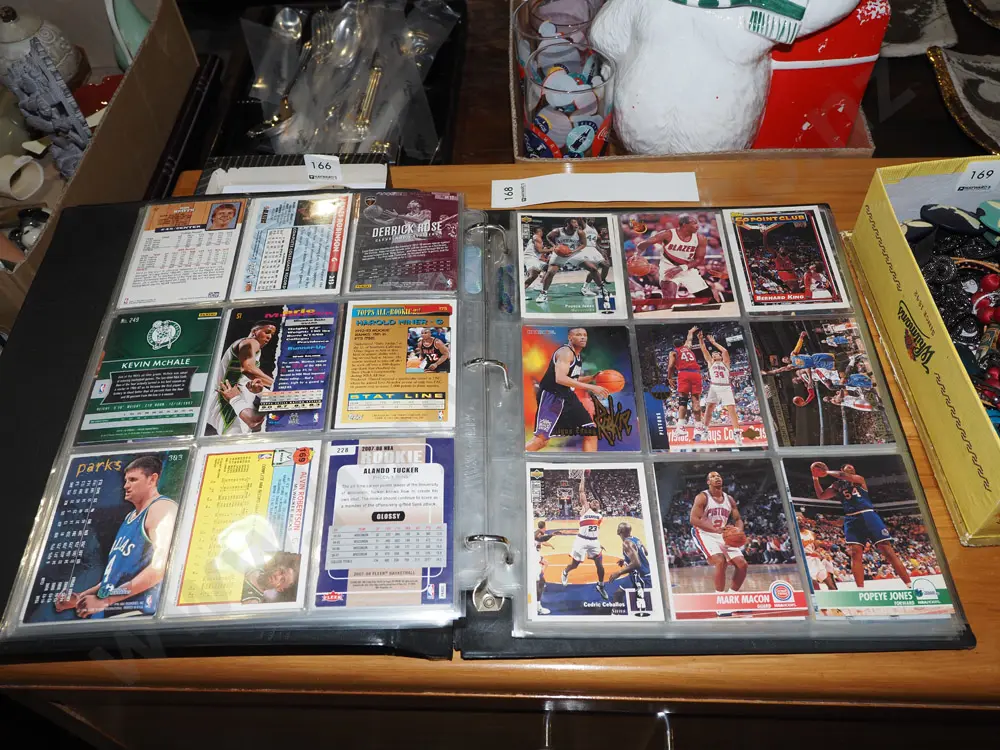 binder of basketball collector cards Image 1++