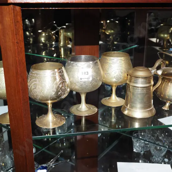 brass goblets, tankard, cauldron