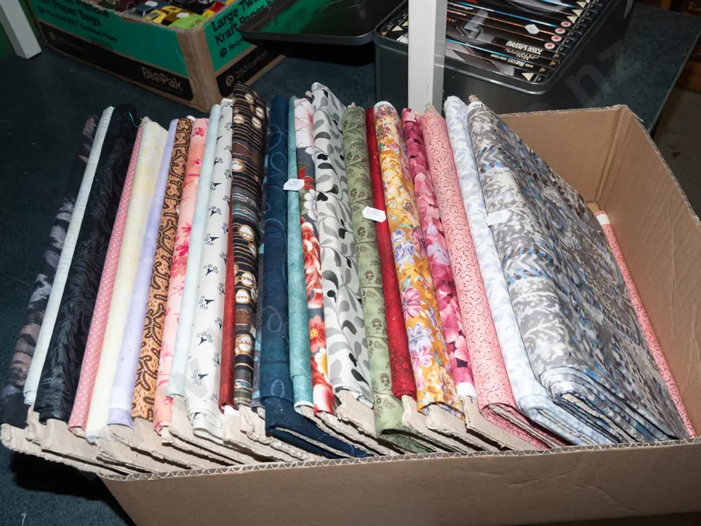 box of fabric pieces Image 1++