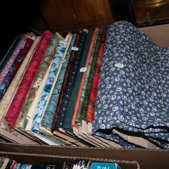 box of fabric pieces