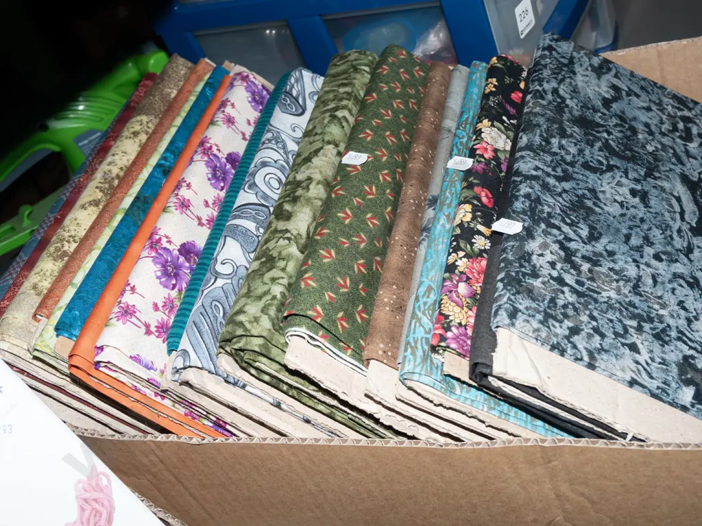 box of fabric pieces Image 1++