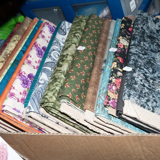 box of fabric pieces