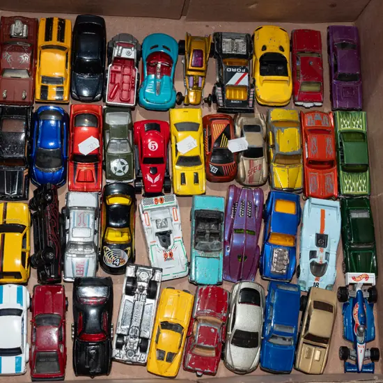 box of toy vehicles